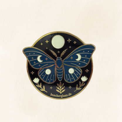 Enchanted Moth E-Reader Grip in Gold mit nachtblauer Mondmotte, Mondphasen und floralen Details auf hellem Hintergrund