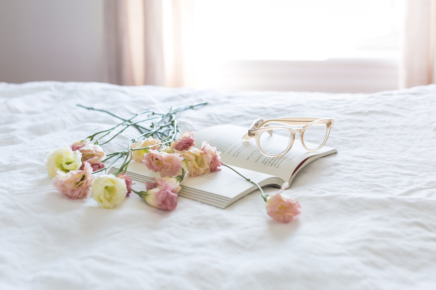pink-yellow-flowers-on-bed